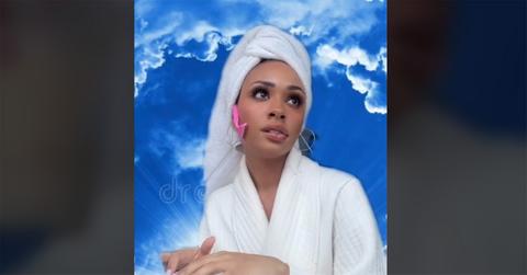 Taryn Delanie Smith in a bathrobe with a towel on her head in a 'Heaven' video