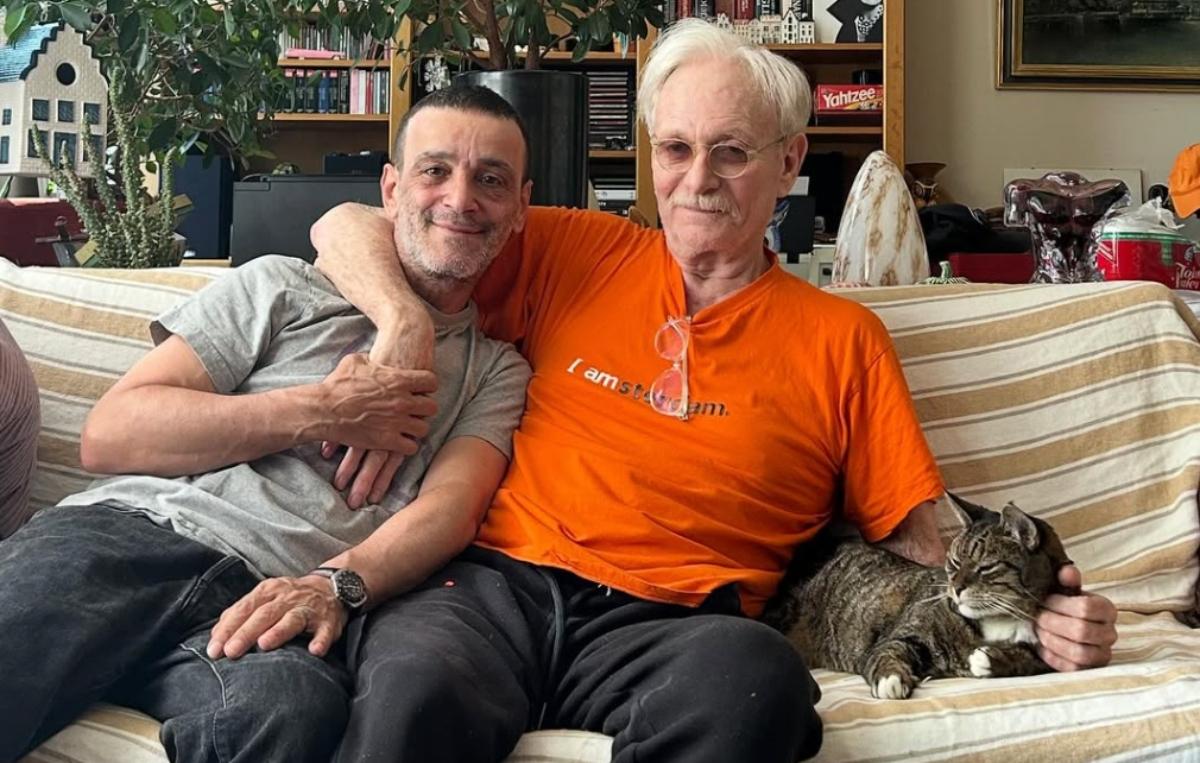 Anthony Geary (C) with his husband Claudio Gama (L) and their cat Max (R)