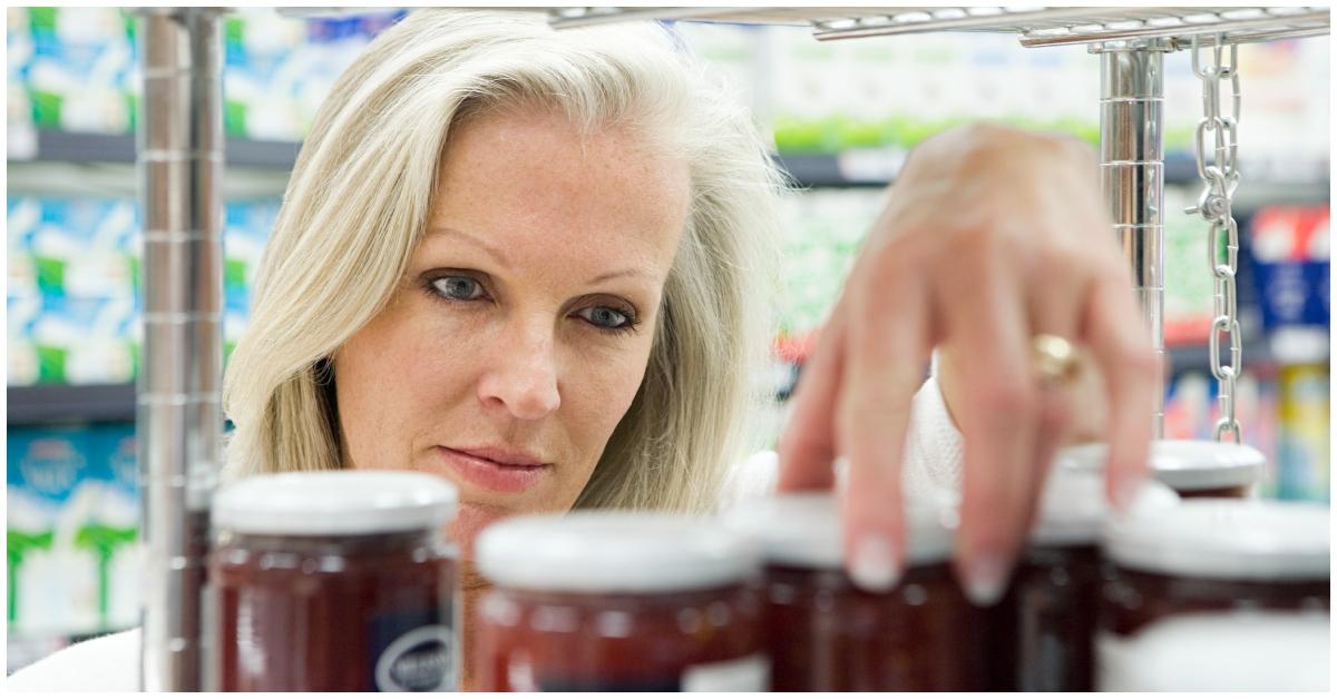 A white woman shopping at a grocery store