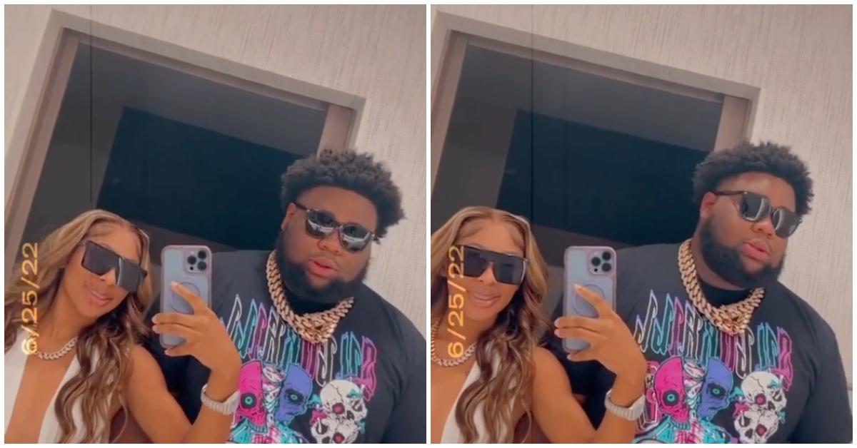 Rod Wave and his girlfriend Kelsey Dee Coleman wear sunglasses and pose for a selfie in the mirror.