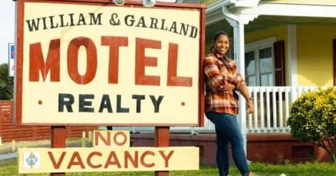 Mika Kleinschmidt poses by the William & Garland Hotel for '100 Day Hotel Challenge'