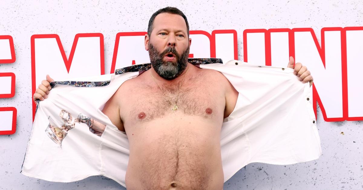 Bert Kreischer opening his shirt and flashing his chest 