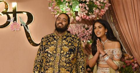 Anant Ambani and his Radhika Merchant pose for a photo on the red carpet during the sangeet ceremony at Jio World Centre in Mumba