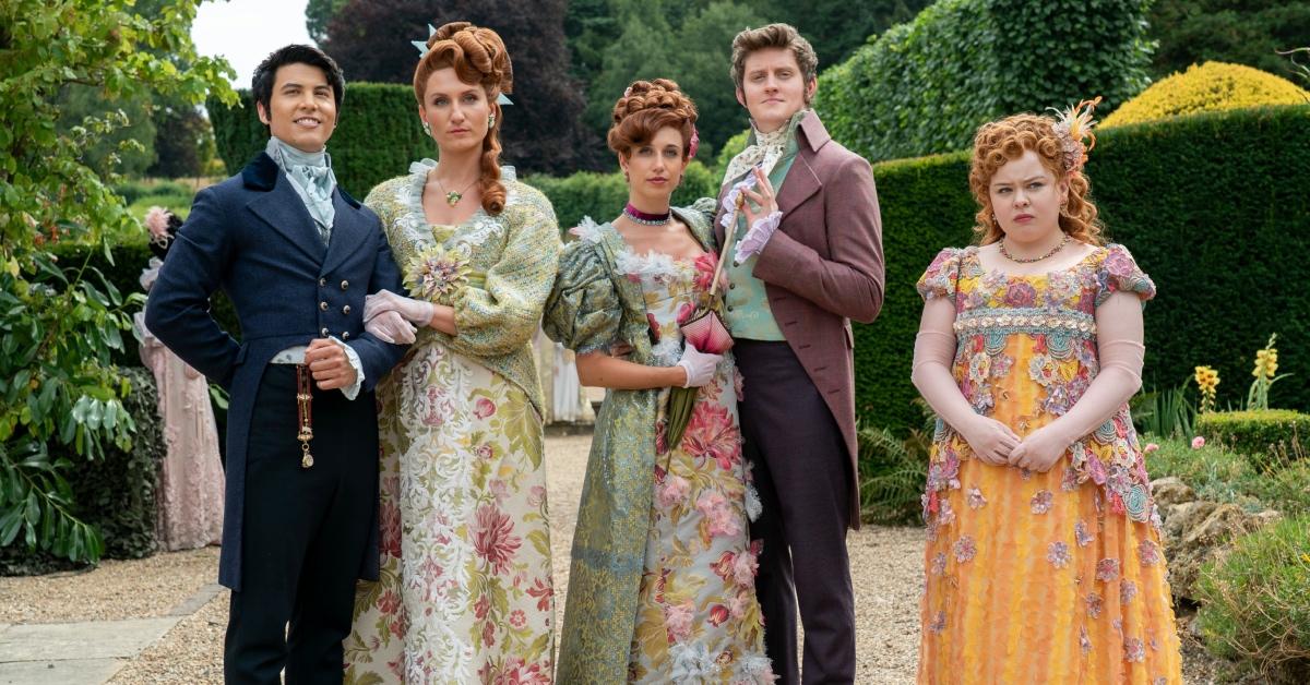 Prudence Featherington with her arm around a man, Philippa Finch and her husband, Albion Finch, and Penelope.