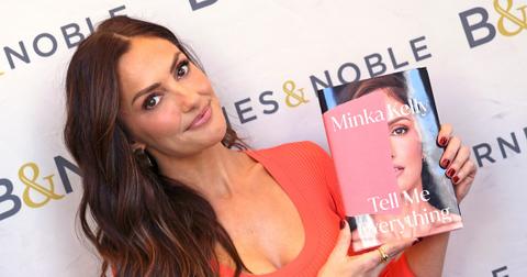 Minka with her memoir, Tell Me Everything
