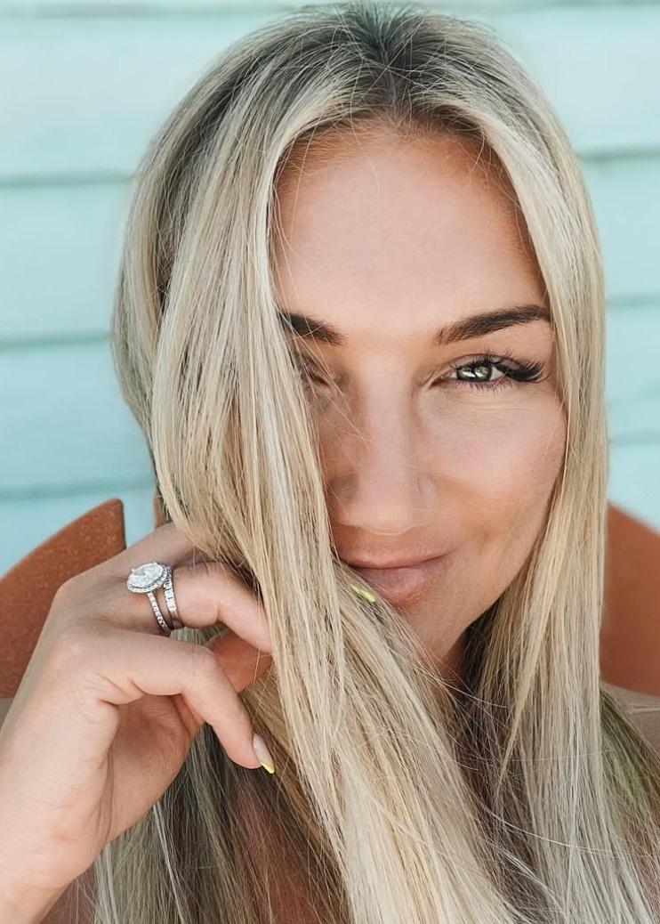 Brooke Hogan now, showing off her wedding ring.