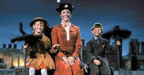 Mary Poppins and the Banks children covered in soot.
