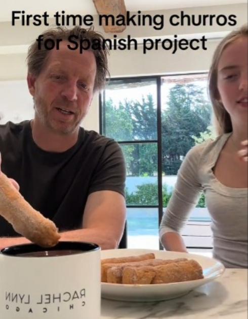 A TikTok user goes to dip a churro shortly before it exploded