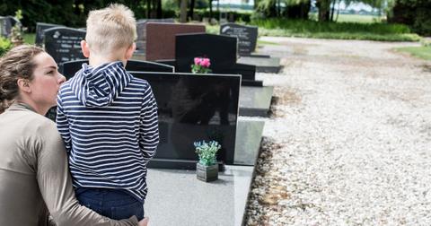 mom-and-son-graveyard-1571346303326.jpg