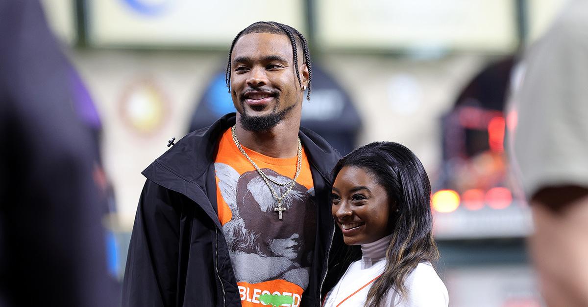 Jonathan Owens and Simone Biles at the World Series. 