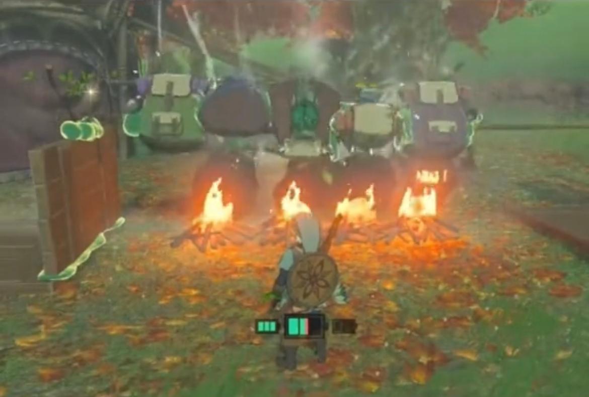 Five Koroks being rotated over an open fire by Zonai devices in 'Tears of the Kingdom'