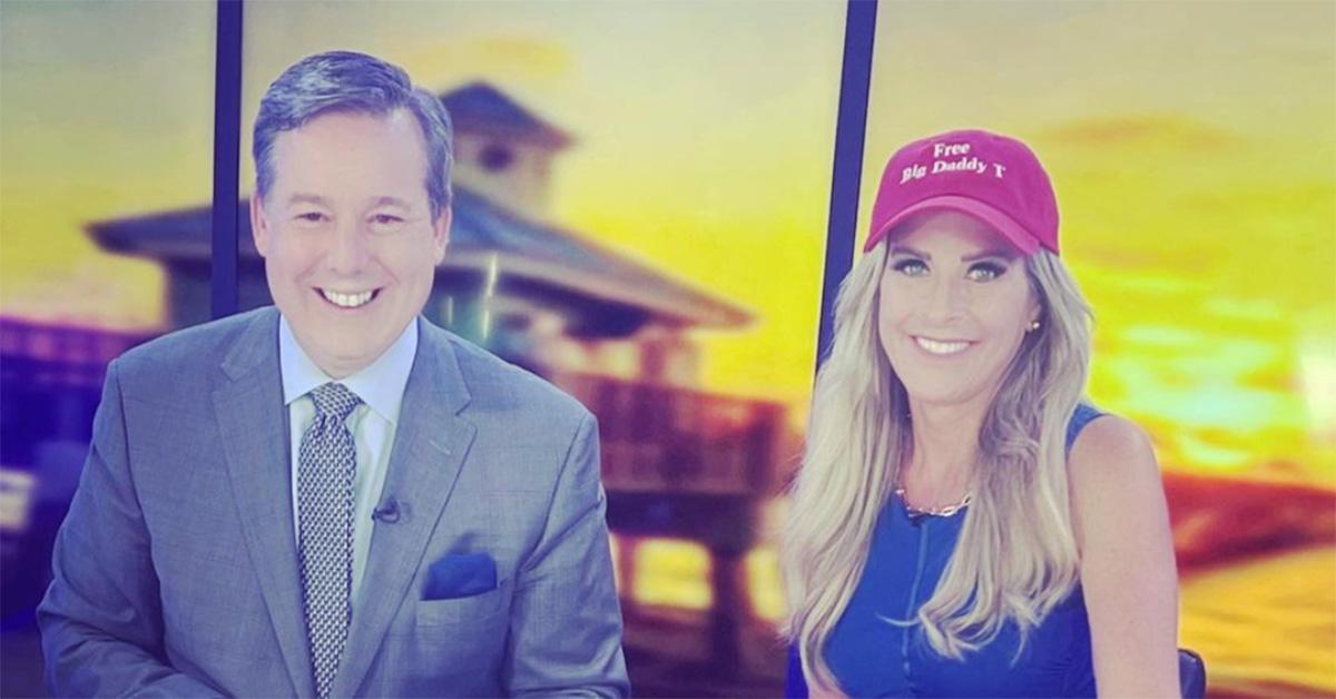 Ed Henry and Karyn Turk on set smiling at the camera. 