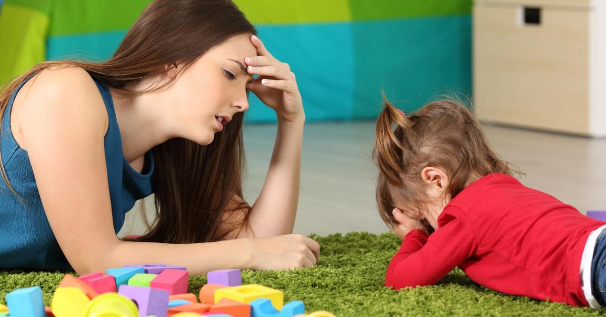 angry baby and tired mother in a room picture id