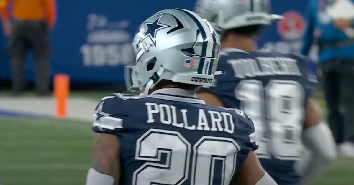 Dallas Cowboys running back Tony Pollard sports a collar-like device on his neck.