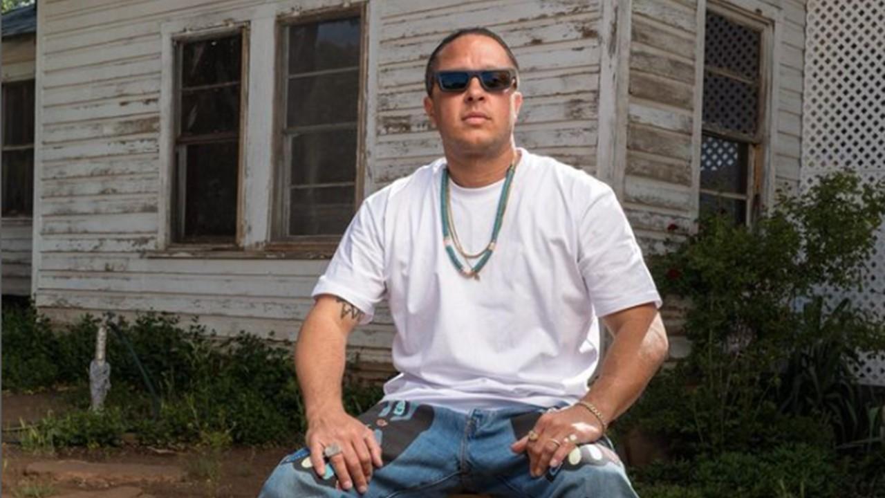 Chris 'Spanto' Printup in front of his father’s old house on the White River Fort Apache Reservation