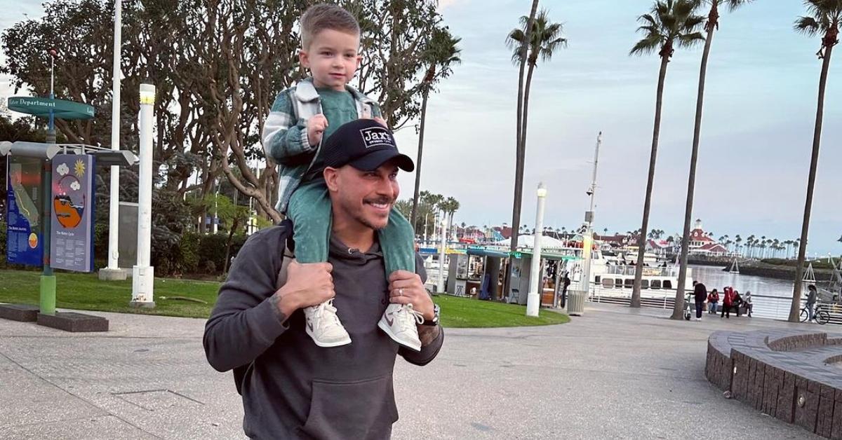 Jax Taylor with his son Cruz on his shoulders