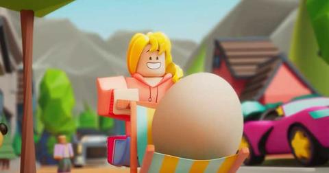A roblox player toting around an egg in 'Adopt Me'