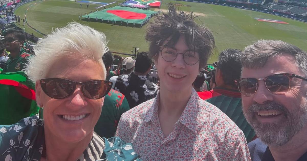 Anne Burrell with her stepson and husband at a cricket game