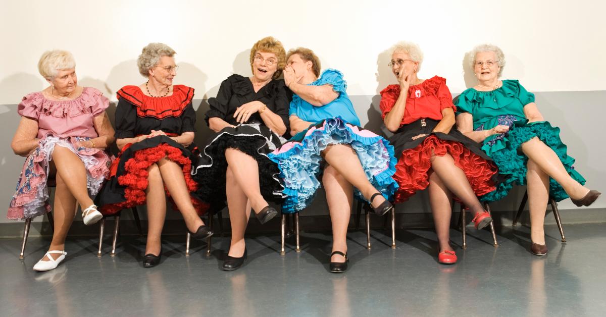 A group of senior women gossiping.