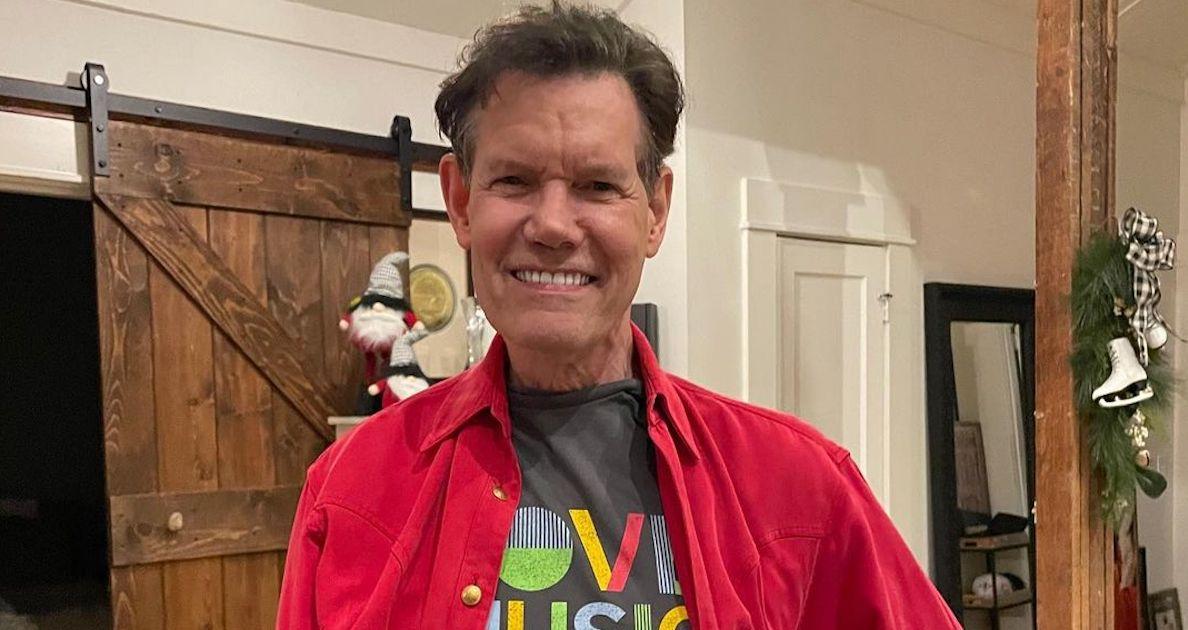 Randy Travis posing in his home on Instagram.