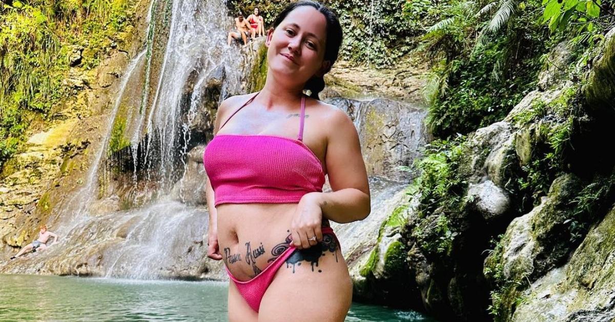 Jenelle Evans in front of a waterfall