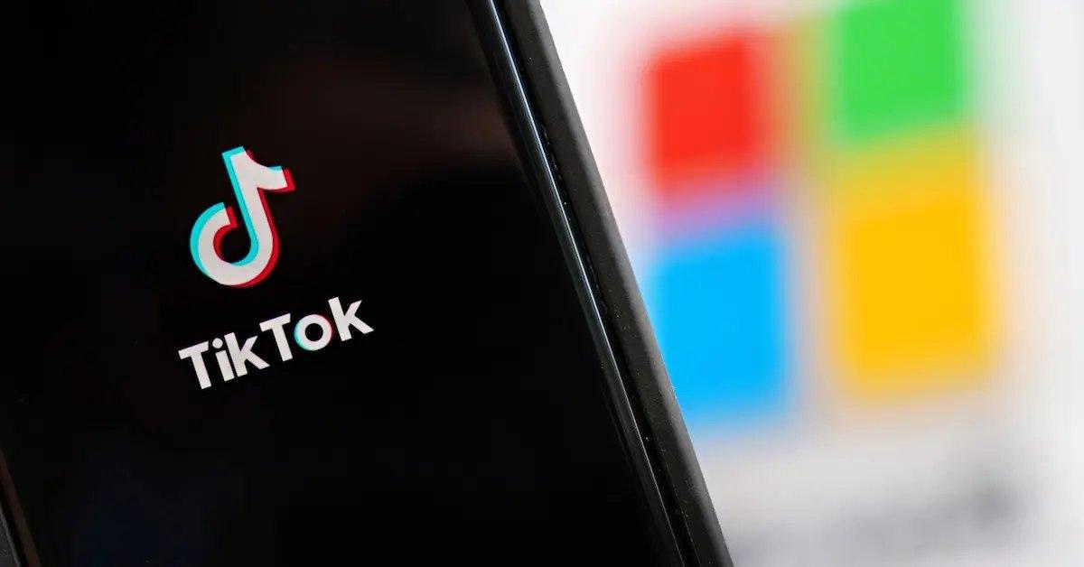 TikTok logo on phone screen.