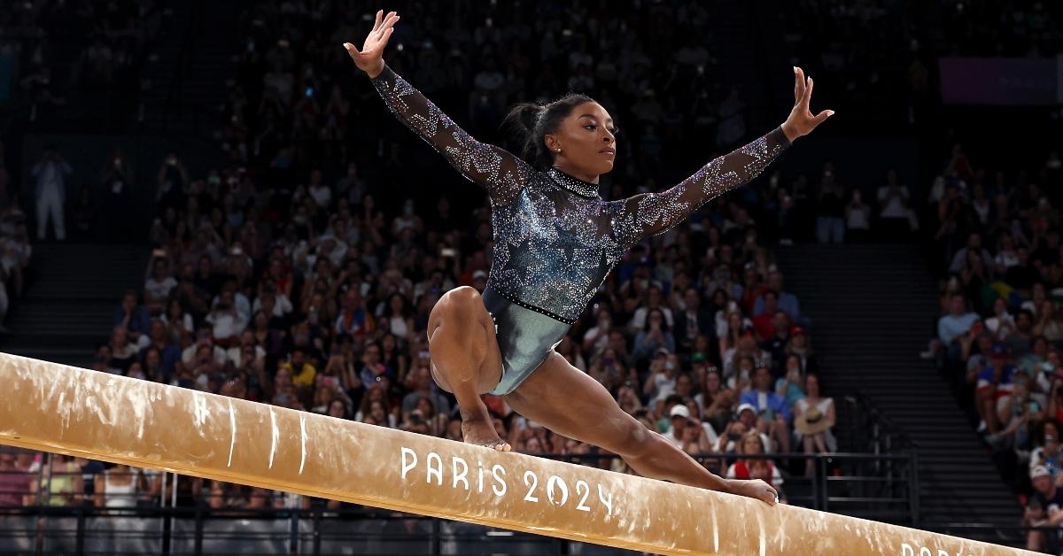 Simone Biles of Team United States competes on the balance beam during the Artistic Gymnastics Women's Qualification on day two of the Olympic Games Paris 2024 at Bercy Arena on July 28, 2024 in Paris, France. (Photo by Jamie Squire/Getty Images)