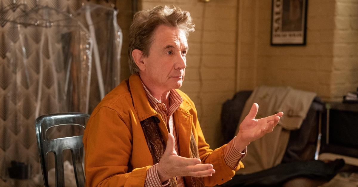 Martin Short as Oliver in 'Only Murders in the Building' wearing an orange jacket.