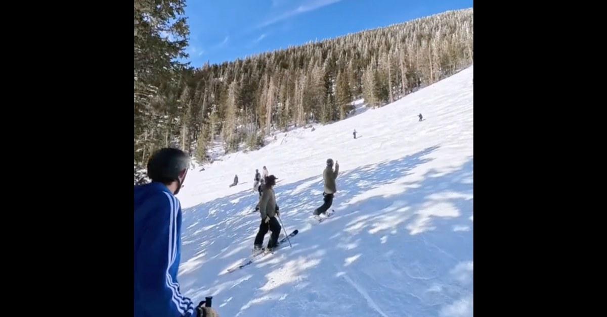 The skier Cheddarski cut off flips him off.