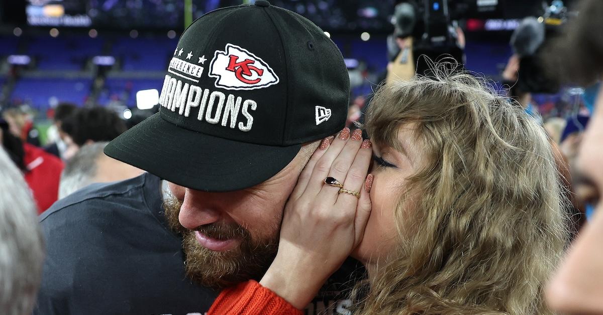 taylor swift whispers in travis kelce's ear