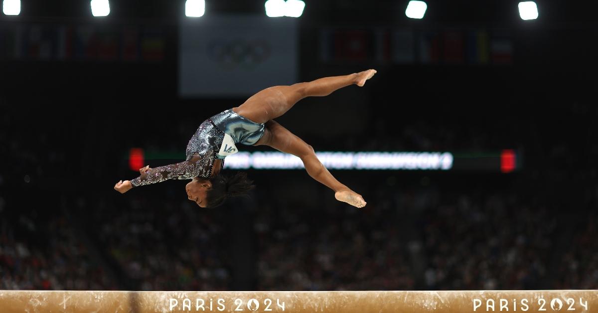 Simone Biles of Team United States competes on the balance beam during the Artistic Gymnastics Women's Qualification on day two of the Olympic Games Paris 2024 at Bercy Arena on July 28, 2024 in Paris, France. (Photo by Naomi Baker/Getty Images)