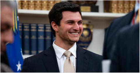 Michael Boulos smiling while looking off to the side