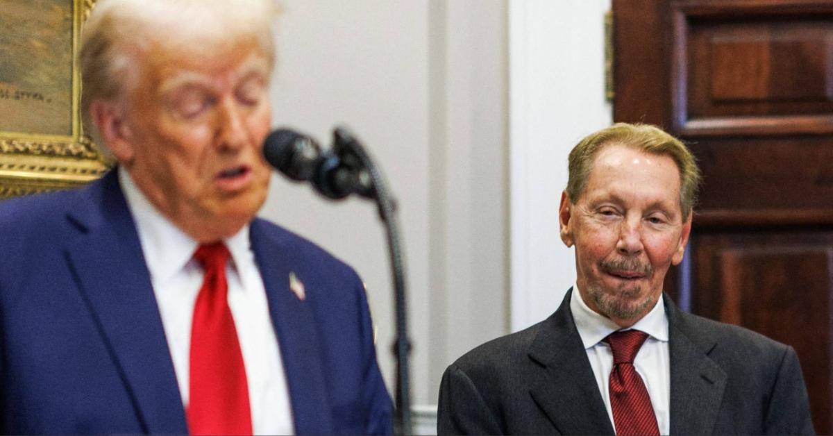 Donald Trump speaks at the White House as Larry Ellison looks on. 