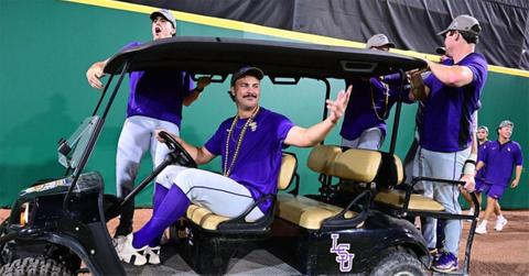 Paul Skenes on a golf cart with his LSU teammates.