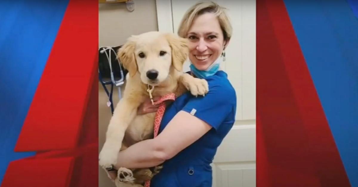 Christina Parcell holding a dog