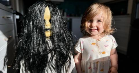 A little girl and her creepy doll