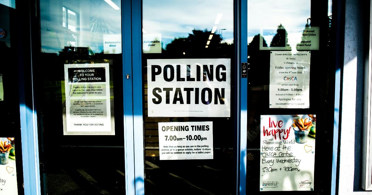 Polling station sign on door.