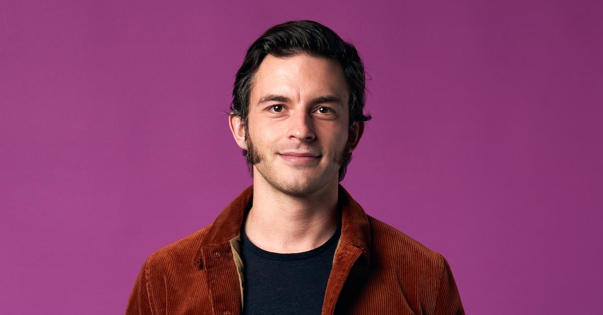 Jonathan Bailey wearing a copper-colored corduroy jacket.