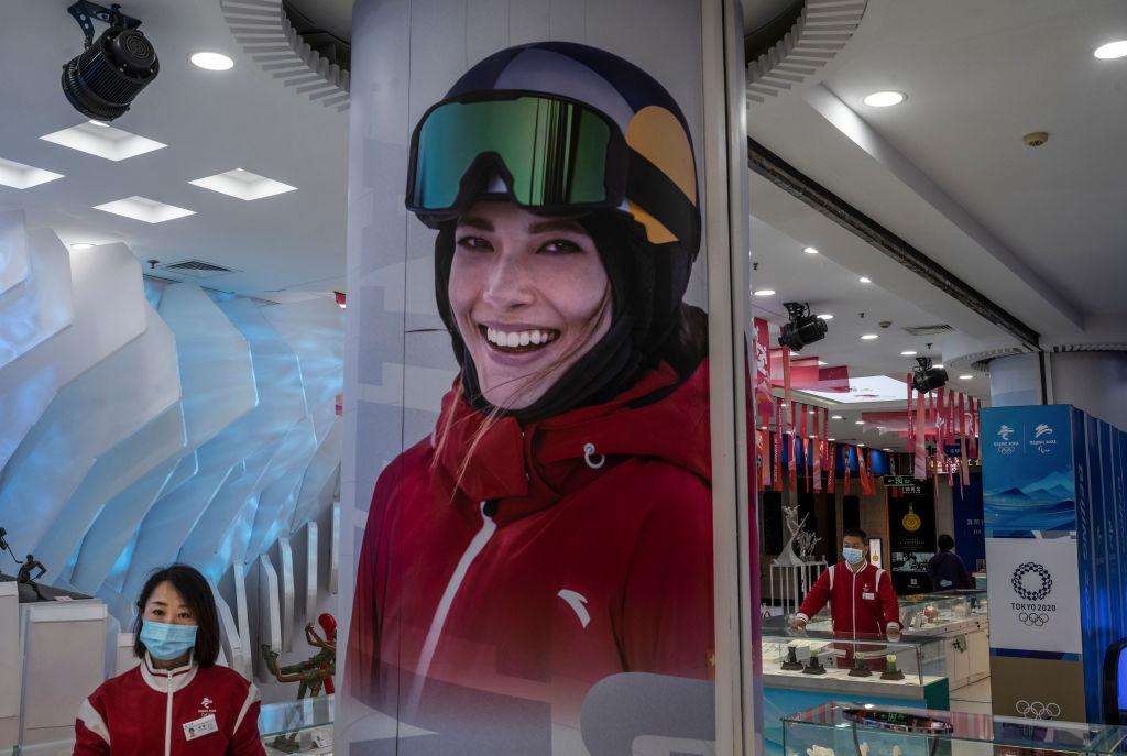 Why does Eileen Gu ski for China?