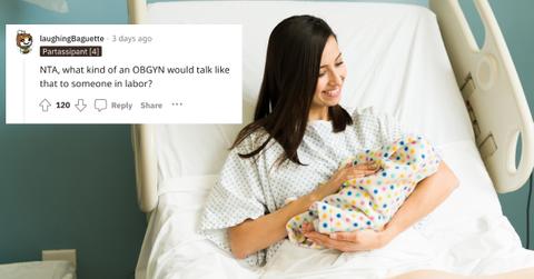 A woman holding her baby.