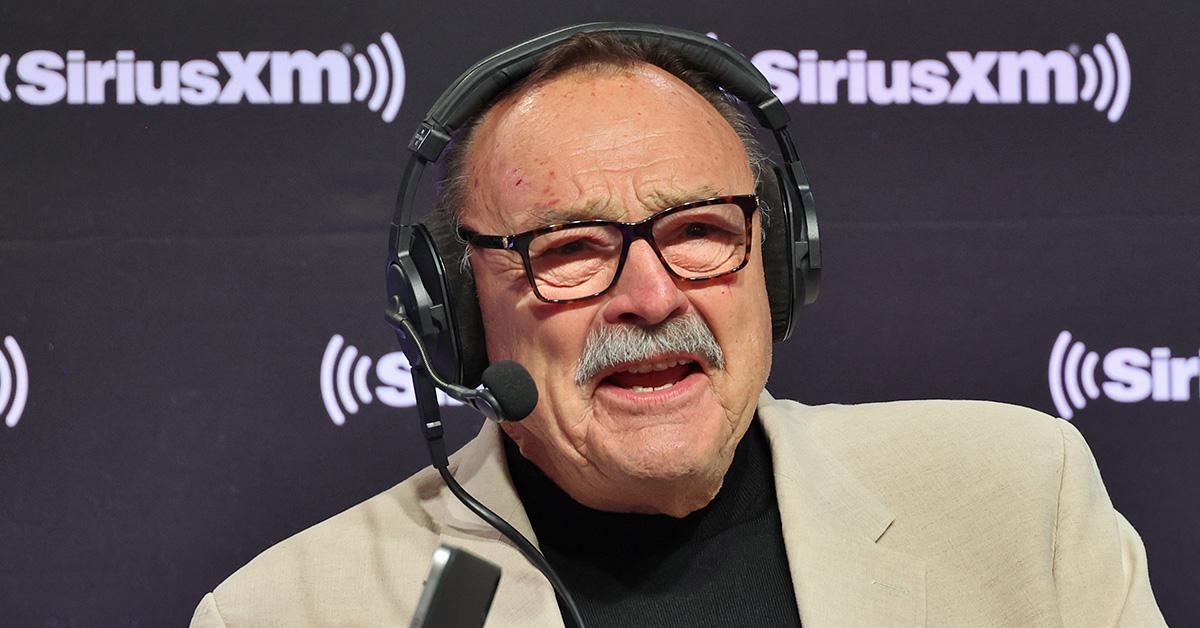 Dick Butkus talking into a mic at Super Bowl LVII. 