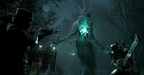 'Remnant II' Players fighting off a Nightweaver in a graveyard.