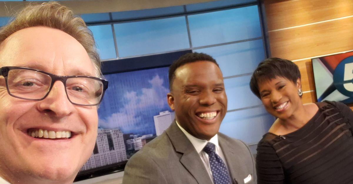 Mark Johnson with his co-workers. 