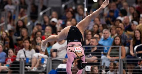 Gymnast Leanne Wong wears one sock during the 2024 Xfinity championship