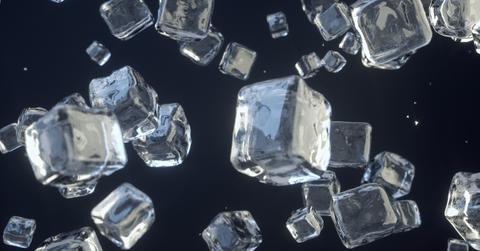 ice cubes falling. Ice crystals. Sugar crystals. Glass blocks. 3D Render.