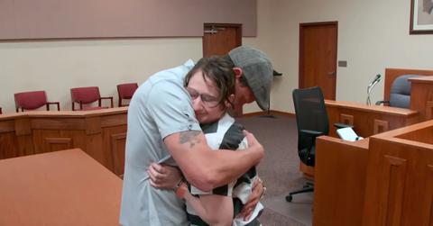 Gypsy Rose Blanchard hugging a man in court.