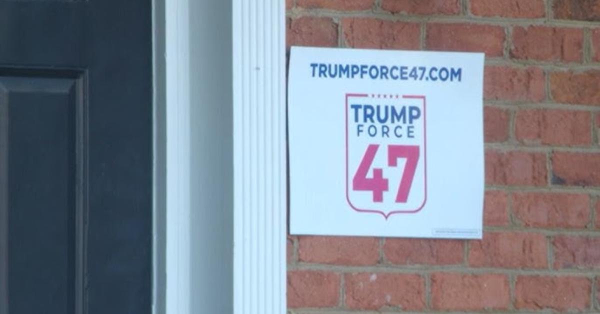 "Trump Forc 47" sign spotted on a brick building.