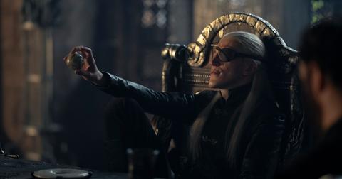 Aemond looking at a ball