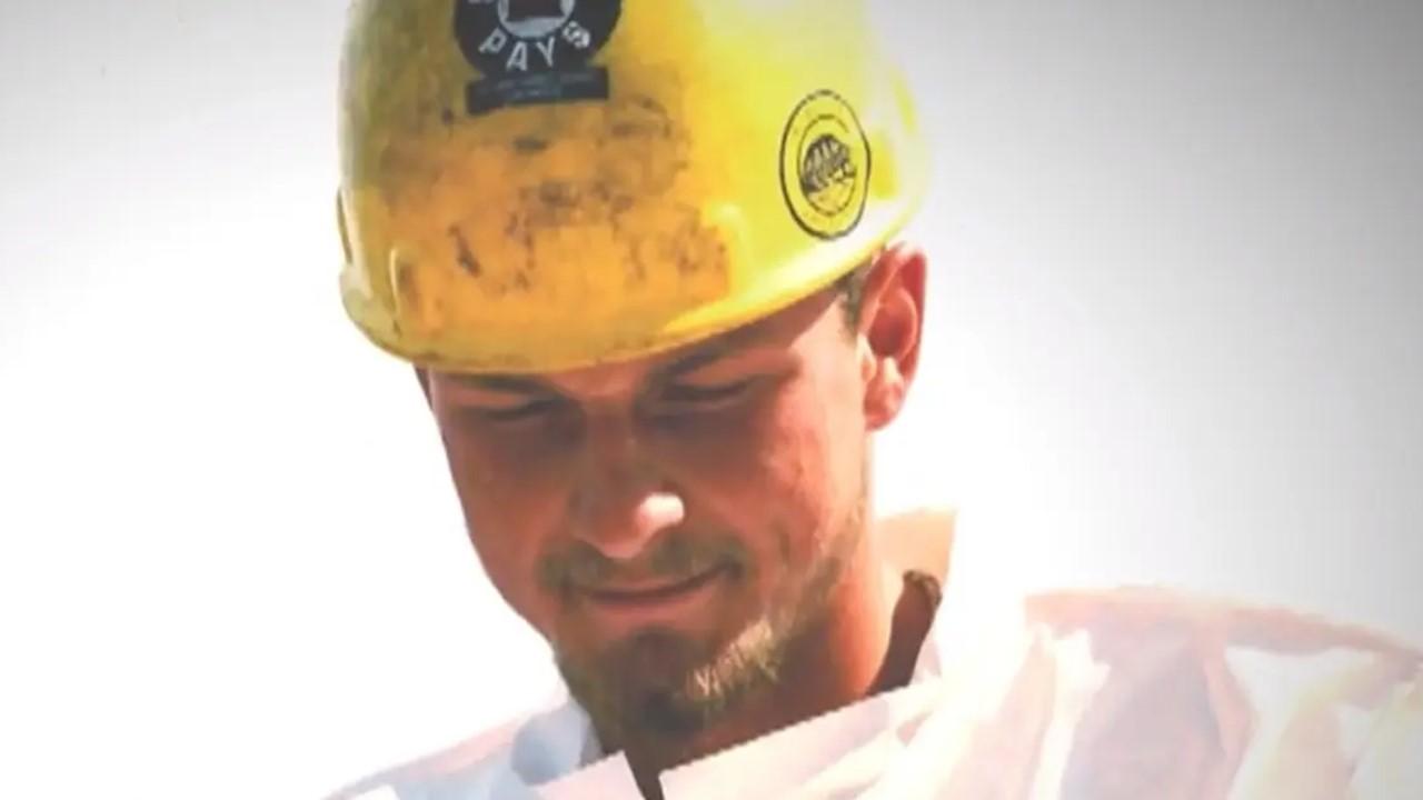 Ricky Cowles Jr. wearing a yellow hard hat