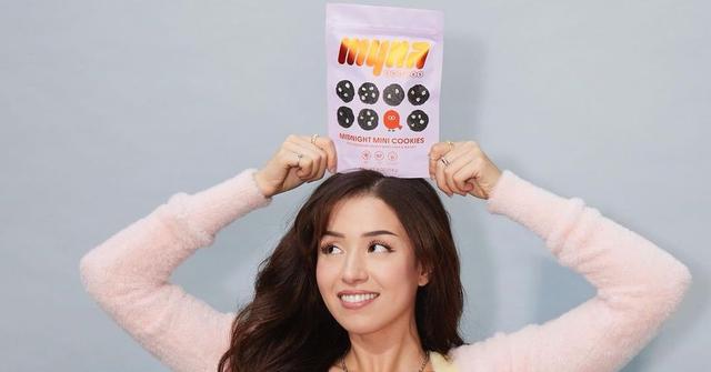 Pokimane posing with myna cookies